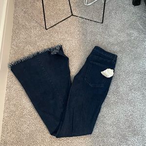 Dark wash bell bottom Altar’d state jeans